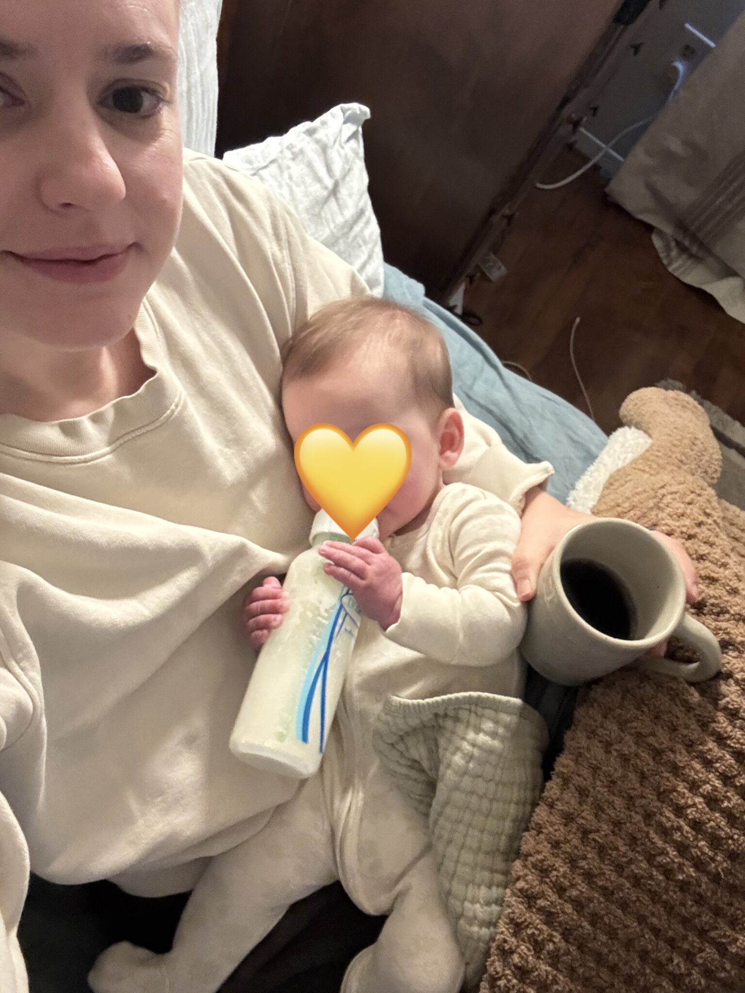 A woman holding a baby.