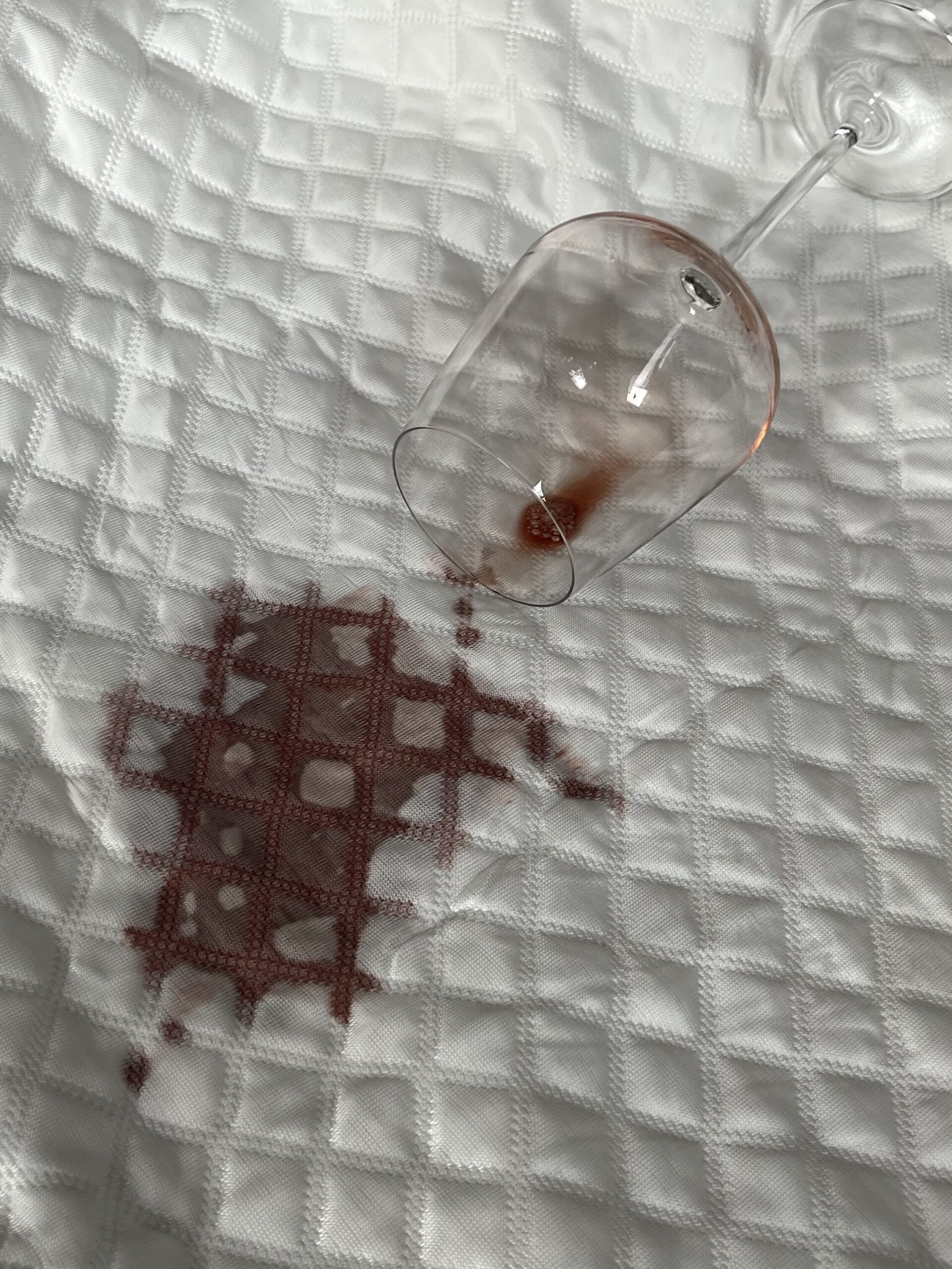 A wine spill on the mattress protector from Silk & Snow